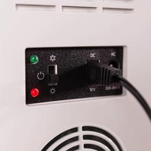 Bolero MiniCooling 10L Bahamas Black Frigorífico con funcionamiento 12V-220V, compatible con coches y caravanas, función enfriamiento y calentamiento, rango temperatura de 7 a 65 ºC y transporte fácil.