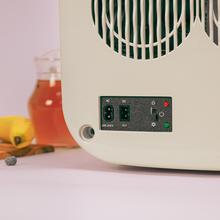 Bolero MiniCooling 25L Bahamas Pink Frigorífico con funcionamiento 12V-220V, compatible con coches y caravanas, función enfriamiento y calentamiento, rango temperatura de 7 a 65 ºC y transporte fácil.