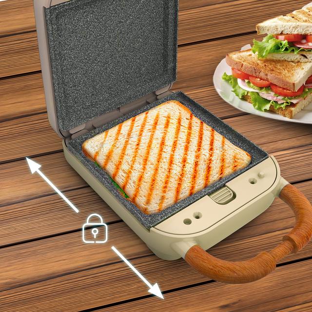 Rock'nToast Retro One Beige Tostiera dallo stile retrò con capacità per un sandwich e 3 paia di piastre rimovibili.