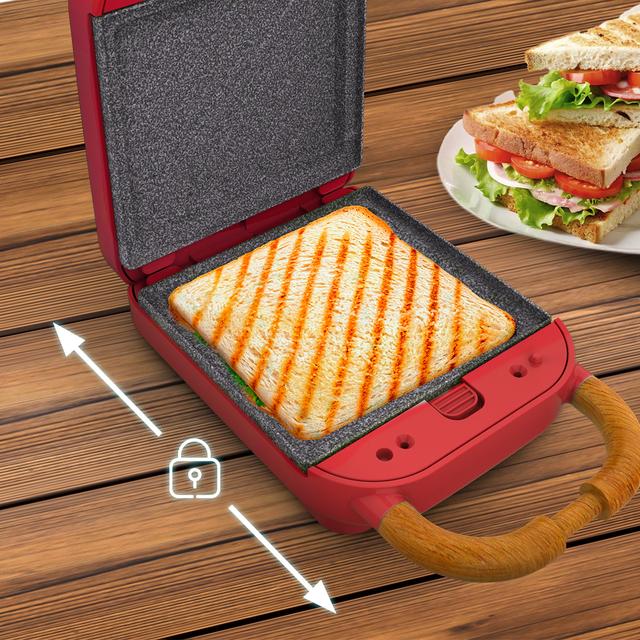 Machine à sandwich Rock'nToast Retro One Red au style rétro avec une capacité pour un sandwich et 3 paires de plaques amovibles.