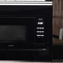 Micro-ondes numérique encastrable GrandHeat 2300 Built-In Black. 800 W de puissance, 23 litres de capacité, gril, 5 niveaux, 8 fonctions préconfigurées et minuterie.