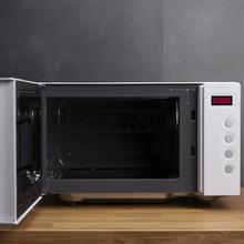 Micro-ondes sans plateau GrandHeat 2000 Flatbed White. 20 litres de capacité, 700 W de puissance, minuterie jusqu'à 60 min, revêtement intérieur en céramique