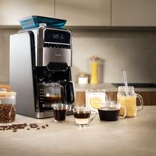 Coffee 66 Grind & Brew Macchina per caffè americano digitale da 12 tazze con finitura in acciaio inossidabile, macinacaffè integrato e intensificatore di aroma.