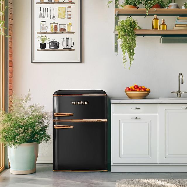 Bolero CoolMarket 2D Origin 86 Black E Mini frigorífico retro de dos puertas negro de 89,3cm de alto y 48,7 de ancho con capacidad de 86L, clase energética E, LED interior y tirador cromado gold rose.