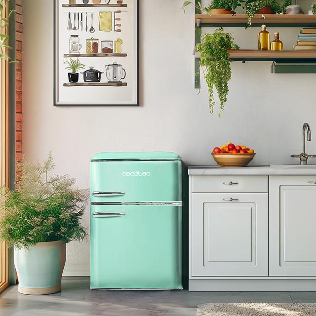 Bolero CoolMarket 2D Origin 86 Green E Mini-réfrigérateur rétro à deux portes vert de 89,3 cm de hauteur et 48,7 cm de largeur avec une capacité de 86 litres, classe énergétique E, éclairage intérieur LED et poignée chromée.