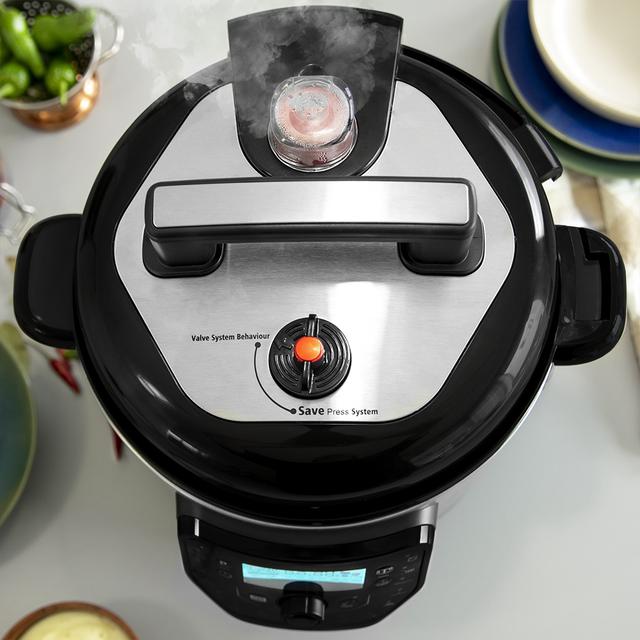 Pentola programmabile Olla GM modello H Deluxe Programmabile 24 ore con 6 litri di capacità Include funzione bilancia con l’innovatore coperchio Advance sollevabile che libera in modo più comodo la pressione.