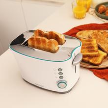 Toast&Taste Double W Tostadora de pan con capacidad para dos tostadas. Incluye pinzas para las tostadas. 650 W de potencia y 7 posiciones de tostado, función descongelar y función recalentar. Sistema de extraelevación, amplia bandeja recogemigas y hueco recogecables.