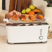 Torradeira de pão Toast&Taste Extra W com capacidade para duas torradas. Inclui porta muffin. 1000 W de potência e 7 posições de tostagem, função descongelar e reaquecer. Sistema extra-lift, bandeja larga para migalhas e orifício para coleta de cabos