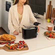 Toast&Taste Double B Toaster für 2 Toastbrote. Inklusive Toastklammern. 650 W Leistung und 7 Röststufen, Auftaufunktion und Aufwärmfunktion. Zusätzliches Höhensystem, große Krümelschublade und Kabelaufbewahrung.