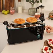 Torradeira de pão Toast&Taste Extra B com capacidade para duas torradas. Inclui porta muffin. 1000 W de potência e 7 posições de tostagem, função descongelar e reaquecer. Sistema extra-lift, bandeja larga para migalhas e orifício para coleta de cabos