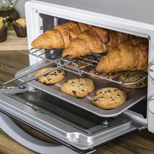 Mini-four Bake&Toast 490. 1000 W, capacité de 10 litres, température jusqu'à 230 °C, minuterie jusqu'à 60 minutes et plateau ramasse-miettes. Il est parfait pour panini et viennoiserie.