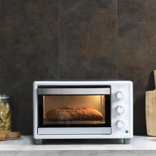 Mini-four Bake&Toast 590. 1500 W, capacité de 23 litres, température jusqu'à 230 °C, minuterie jusqu'à 60 minutes, 3 modes de cuisson et plateau ramasse-miettes inclus.