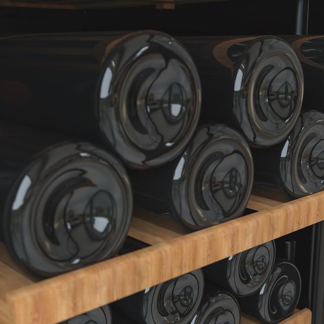 Cave à vin Bolero GrandSommelier Duo 77000 Noir d'une capacité de 77 bouteilles et d'un système de refroidissement par compresseur qui garantit des performances élevées, offrant une double zone pour le vin rouge, blanc ou champagne. Température réglable et lumière LED intérieure.