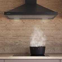 Bolero Flux PM 906500 Black A Campana piramidal de 90cm de ancho, acabado negro, succión 650m3/h, Motor 165W, Clase A, control mecánico, 3 niveles de potencia, luz y filtro de carbono.
