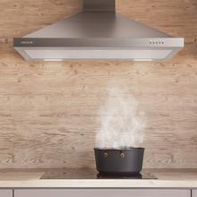 Bolero Flux PM 906500 Inox A Campana piramidal de 90cm de ancho, acabado inox, succión 650m3/h, Motor 165W, Clase A, control mecánico, 3 niveles de potencia, luz y filtro de carbono.