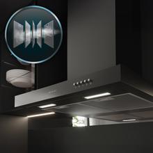 Bolero Flux TM 606500 Black A Campana T de 60cm de ancho, acabado negro, succión 650m3/h, Motor 165W, Clase A, control mecánico, 3 niveles de potencia, luz y filtro de carbono.