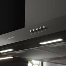 Bolero Flux TM 606500 Black A Campana T de 60cm de ancho, acabado negro, succión 650m3/h, Motor 165W, Clase A, control mecánico, 3 niveles de potencia, luz y filtro de carbono.