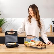 Rock'nToast Grill + 2-Sandwichmaker aus Edelstahl, 800 W Leistung und antihaftbeschichtete Grillplatten.