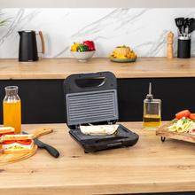 Rock'nToast Grill + Sandwichera de 2 sándwiches con acabados en acero inoxidable, 800 W de potencia y placas grill con revestimiento antiadherente.