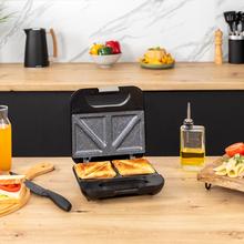 Rock'nToast Classic + Sandwichera de 2 sándwiches con acabados en acero inoxidable, 800 W de potencia y placas triangulares con revestimiento antiadherente.