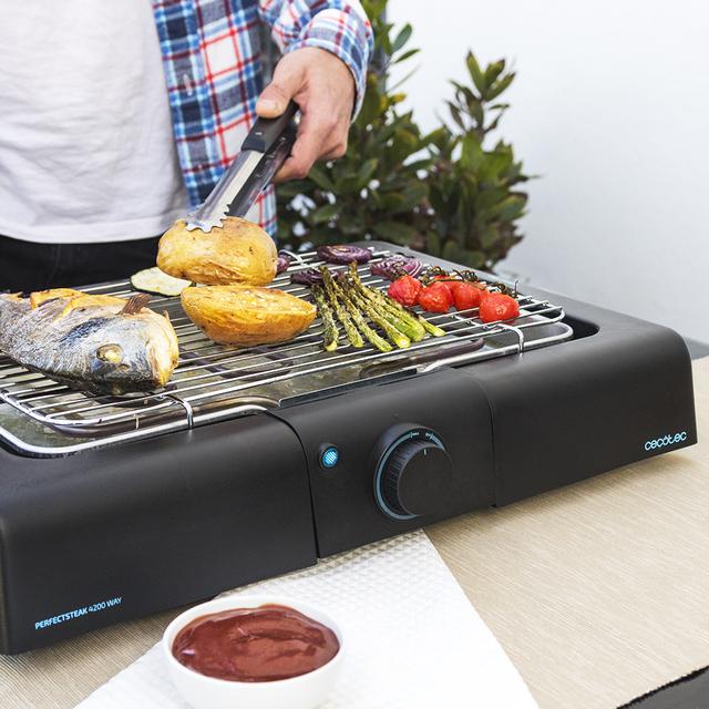 PerfectSteak 4200 Way Elektro-Tischgrill mit 2400 W, Edelstahlgrill und 3 Stufen höhenverstellbar.