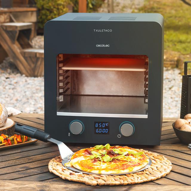 Txuletaco 8000 Inferno. Four avec 2200 W, grille en fer fondu, pierre et plateau pour cuire des pizzas, 2 plateaux ramasse-graisses, température jusqu'à 850 ºC, thermomètre de cuisine numérique inclus