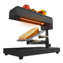 Raclette Cheese&Grill 6000 Black. 600 W de puissance, fonction Gril, finition en acier inoxydable, thermostat réglable, 2 spatules en bois, gril supérieur antiadhésif, gril supérieur antiadhésif