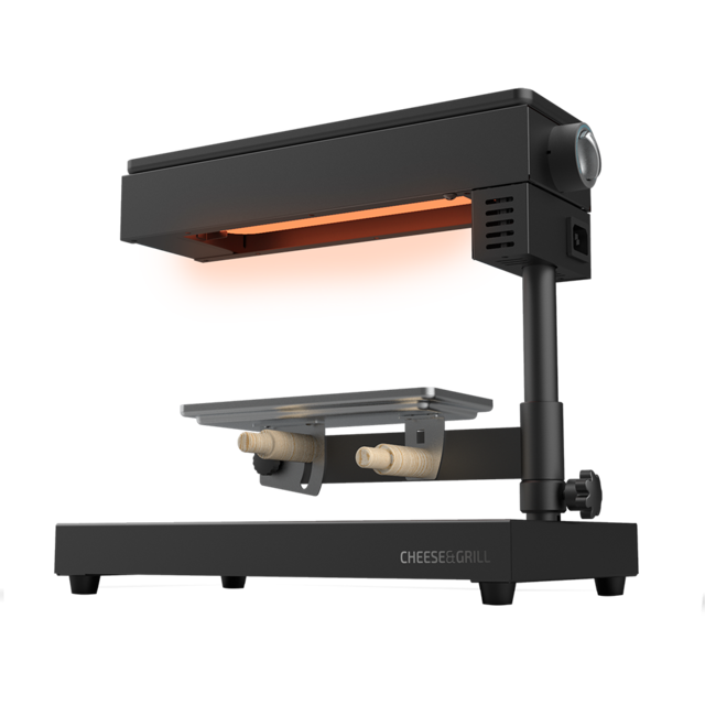 Raclette Cheese&Grill 6000 Black. 600 W potenza, funzione grill, finiture acciaio inox, termostato regolabile, 2 spatole di legno, griglia superiore antiaderente