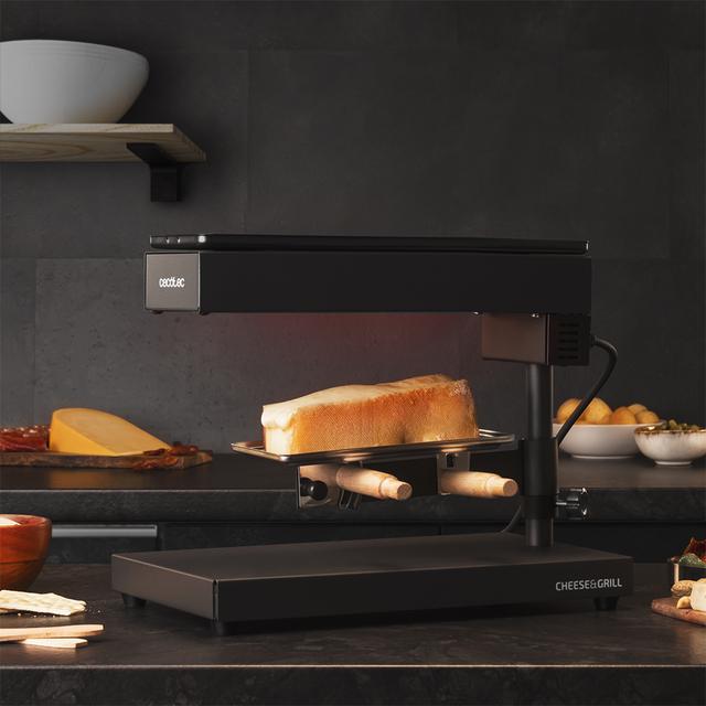 Cheese&Grill 6000 Black. Raclette com Potência 600 W, Função Grill, Acabamento em aço inoxidável, Termóstato ajustável, 2 Espátulas de madeira, Grelhador superantiaderente