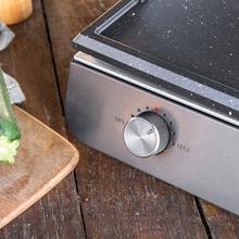 Barbecue électrique PerfectRoast 3000 Inox. 3000 W de puissance, surface de cuisson mixte avec revêtement antiadhésif Rockstone, thermostat réglable et plateau ramasse-graisses.