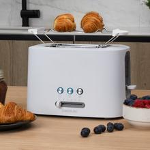 Grille-pain Toast&Taste 9000 Double White. 980 W, 2 fentes courtes extra-larges, fonction Réchauffer, Décongeler et Annuler, plastique, baguettes supérieures et design en blanc.