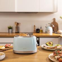 Grille-pain Toast&Taste 800 Vintage Light Blue. 850 W, deux fentes courtes extra-larges de 3,8 cm, capacité pour 2 toasts, finitions en acier inoxydable, style rétro, 3 fonctions, bleu.