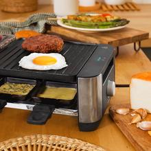 Cheese&Grill 16000 Inox Mixgrill Máquina de Raclette para 8 personas con grill de 1400 W. Con estructura de diseño con acabados en acero inoxidable, termostato regulable y dos placas de asar una de aluminio fundido con revestimiento antiadherente y la otra de piedra natural. Incluye 8 sartenes pequeñas antiadherentes y 8 espátulas de madera.