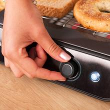 Turbo EasyToast InoxDark Tostador plano horizontal de tres resistencias con 900 W para todo tipo de pan o bollería, 6 niveles de potencia y bandeja recogemigas de fácil extracción.