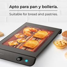 ‌Turbo EasyToast InoxDark Torradeira plana horizontal de 3 resistências com 900 W para todo o tipo de pão ou pastelaria, 6 níveis de potência e bandeja recolhe-migalhas de fácil extração.