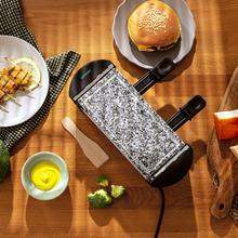 Raclette Cheese&Grill 3200 Pocket AllStone Máquina de raclette para 2 pessoas com grelhador de 320 W. Com estrutura de design com acabamento em aço inoxidável, botão Ligar/Desligar e placa de grelhar em pedra. Inclui 2 mini-frigideiras antiaderentes e 1 espátula de madeira.