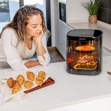 Friggitrice ad aria Cecofry DuoHeat 6000 con doppia resistenza per una perfetta doratura e sapore di grigliata nelle carni, capacità di 6 litri e potenza di 2200 W per piatti sani.