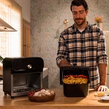 Cecofry Smokin' Duo 6000 Friteuse à air avec double résistance pour un grillage parfait de la viande, fonction Fumage, capacité de 6 litres et puissance de 2200 W pour des plats sains.