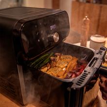 Cecofry Smokin' Duo 6000 Friteuse à air avec double résistance pour un grillage parfait de la viande, fonction Fumage, capacité de 6 litres et puissance de 2200 W pour des plats sains.