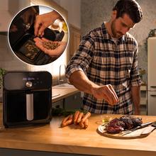 Cecofry Smokin' Duo 6000 Friteuse à air avec double résistance pour un grillage parfait de la viande, fonction Fumage, capacité de 6 litres et puissance de 2200 W pour des plats sains.