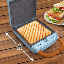 Rock'nToast Retro One Blue Sandwichera con estilo retro con capacidad para un sandwich y 3 pares de placas desmontables.