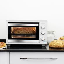 Bake&Toast 2600 White 4Pizza Forno elettrico a convezione da 26 litri con pietra speciale per pizza e 6 funzioni diverse.