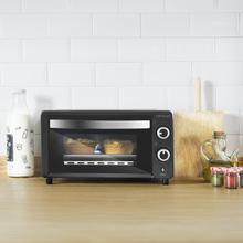 ‌Bake&Toast 1090 Black Mini-forno elétrico multifunções, 10 litros de capacidade e porta com vidro duplo.