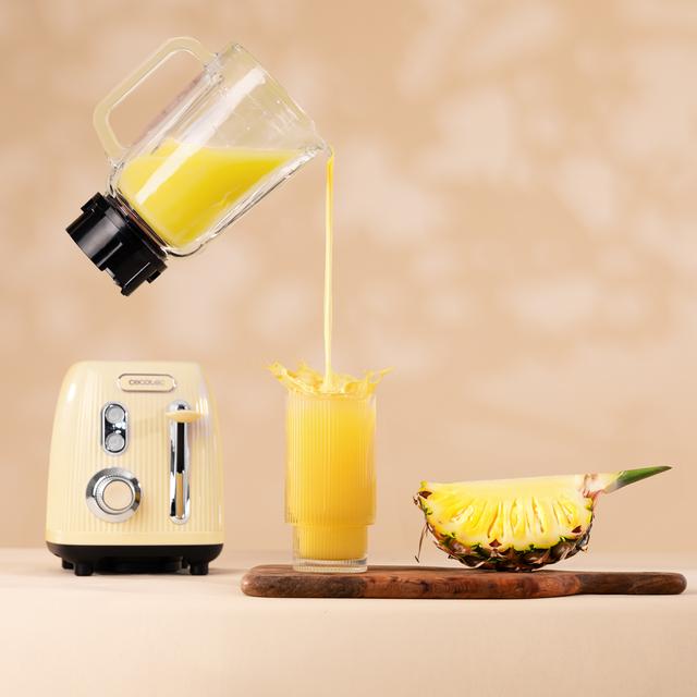 Power Black Titanium RetroYellow Mixeur-blender rétro d'une puissance maximale de 1200 W, avec 4 lames revêtues en titane noir et un bol d'une capacité de 1,5 L.