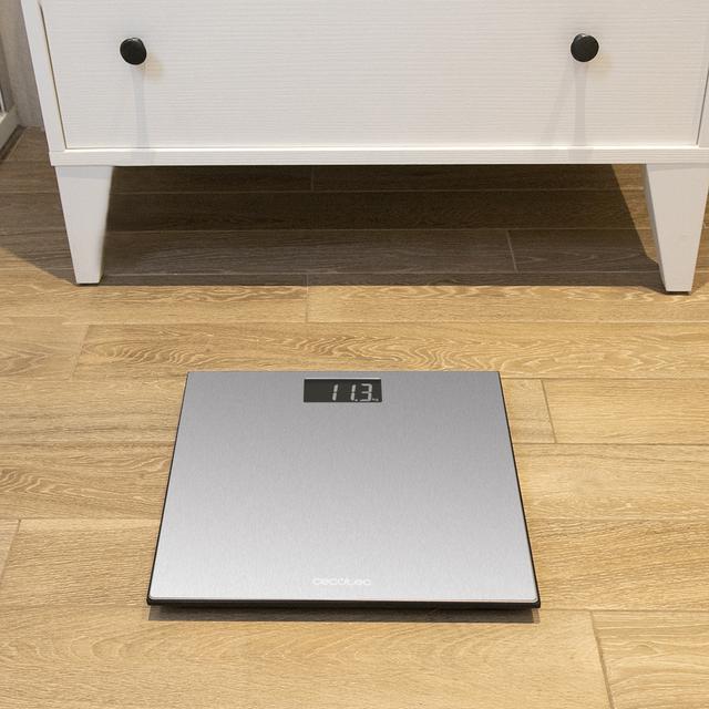 Pèse-personne numérique Surface Precision 9200 Healthy avec plateforme en acier inoxydable de haute précision, ruban à mesurer, écran LCD inversé et poids maximal jusqu’à 180 kg.