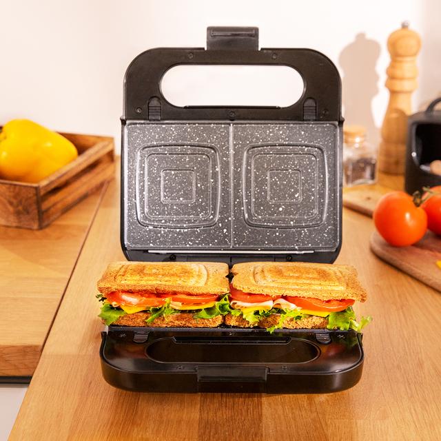 Appareil à sandwichs Rock´nToast 4in1. 1000 W de puissance, capacité pour 2 sandwichs, finition en acier inoxydable, 4 plaques interchangeables avec revêtement en pierre RockStone.