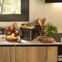 Friteuse avec huile de 4,2 litres Cleanfry Luxury 4000 Dark. 3270 W, acier inoxydable laqué noir, 5 programmes préétablis et filtre OilCleaner.