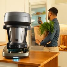 Mambo Maxi V Robot da cucina multifunzionale con dispenser di alimenti.