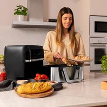 Friteuse diététique numérique et compacte Cecofry Dual 9000 pour cuisiner sans huile, avec 9 L de capacité, double contrôle de température, technologie PerfectCook et possibilité de diviser la cuve en deux paniers de 4,5 litres chacun.