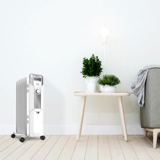 Radiateur bain d’huile 360º Ready Warm 5600 Space White. 7 éléments, faible consommation, 1500 W, 3 niveaux de puissance, protection contre la surchauffe et le renversement, roues, jusqu'à 15 m² de surface couverte